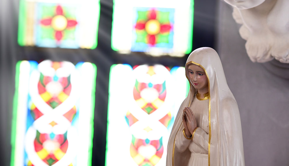 Stained Glass with Statue of Mary